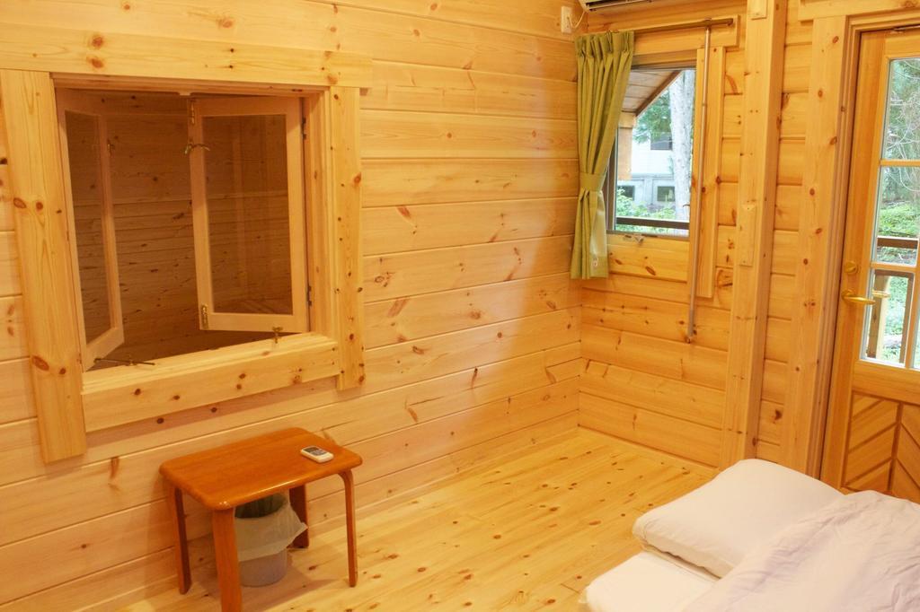 Hakubagoryu Pension&Logcottage Arumu Экстерьер фото