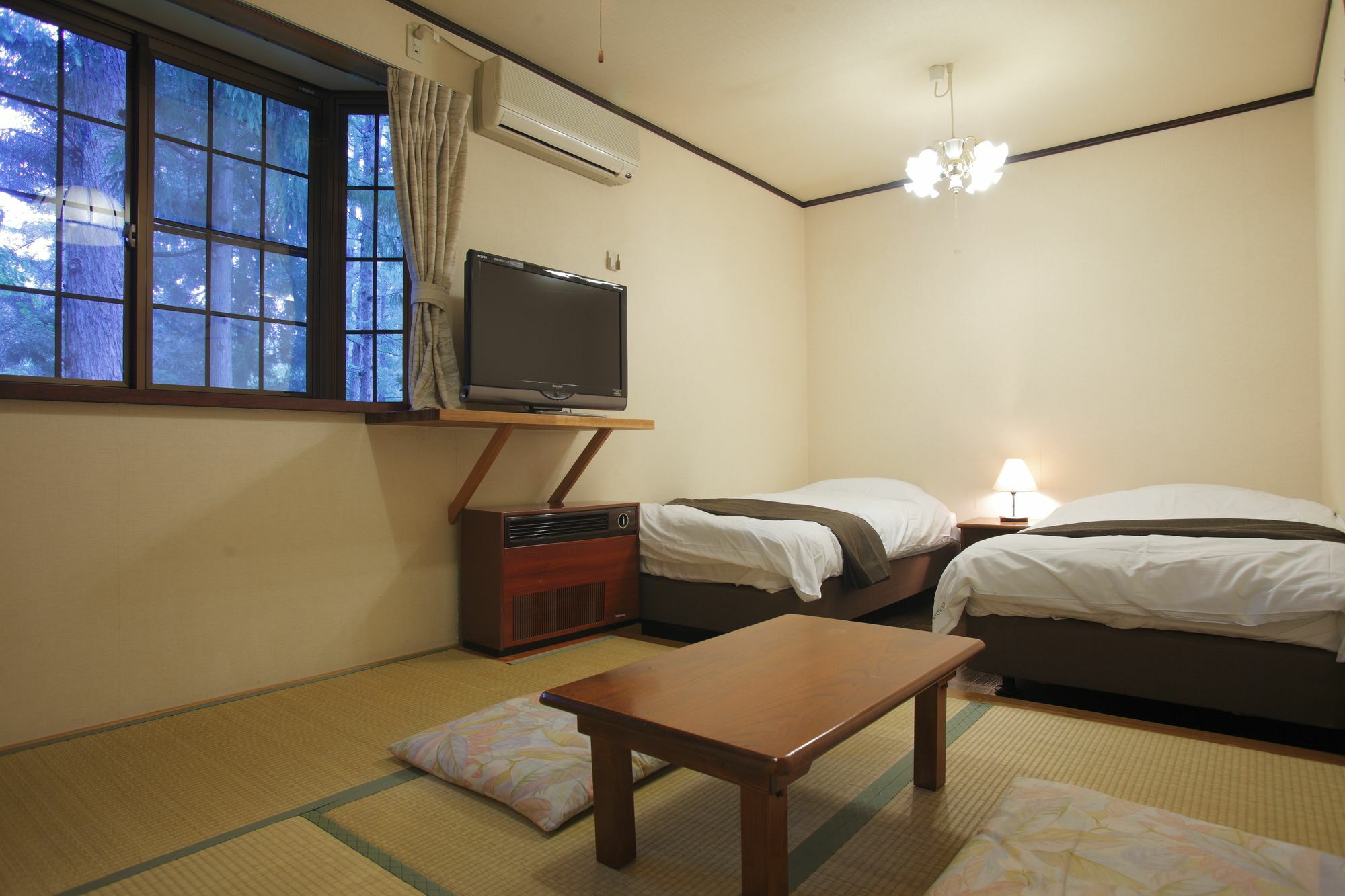 Hakubagoryu Pension&Logcottage Arumu Экстерьер фото